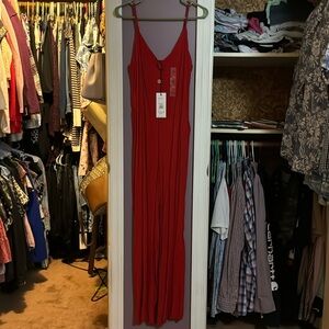 XL red jumper with red earrings